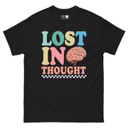 The phrase "LOST IN THOUGHT" in a playful, multi-colored font. "LOST" is teal, yellow, and blue. "IN" is yellow and pink. "THOUGHT" is peach. A brain graphic is next to the word "IN". A black and white checkered pattern is at the bottom.