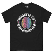A circular design with a white border. Inside, a brain is split into two halves, one colored with warm tones (yellow, orange, pink, red) and the other with cool tones (blue, green, purple). The white text "MEMBER OF THE OVERTHINKING CLUB" curves around the brain, with colorful handprints on either side.