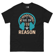 A teal headphone graphic with the text "MY HEADPHONES ARE ON FOR A REASON" in a mix of white and light orange fonts. "MY HEADPHONES" is curved along the top of the headphones, "ARE ON" is centered, "FOR A" is below it with lightning bolts, and "REASON" is at the bottom.