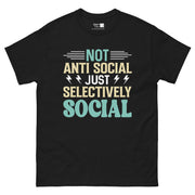 The phrase "NOT ANTI SOCIAL JUST SELECTIVELY SOCIAL" in a layered design. "NOT" is teal, "ANTI SOCIAL" is light yellow, "JUST" is white with lightning bolts, "SELECTIVELY" is light yellow, and the final "SOCIAL" is teal. Horizontal lines frame the words "NOT" and "JUST".